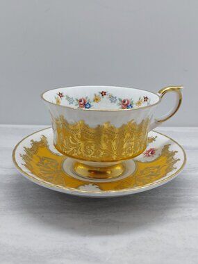 Vintage Paragon Yellow Gold Trenton Footed Tea cup & Saucer Set